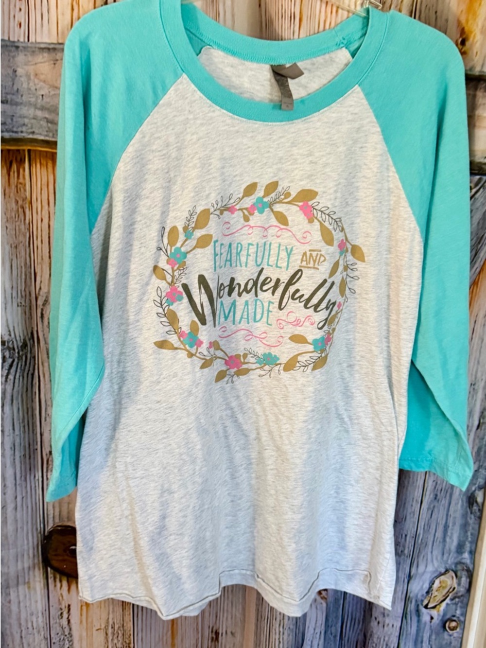Turquoise Sleeve Raglan Tee with Floral Wreath Graphic
